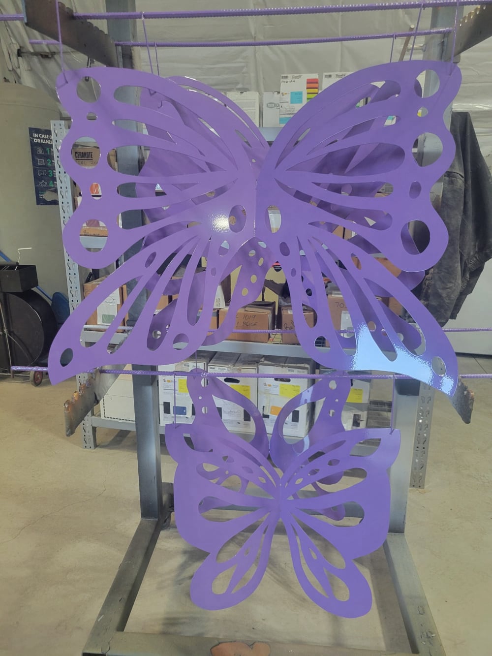 Laser cut and welded purple powder coated metal butterfly