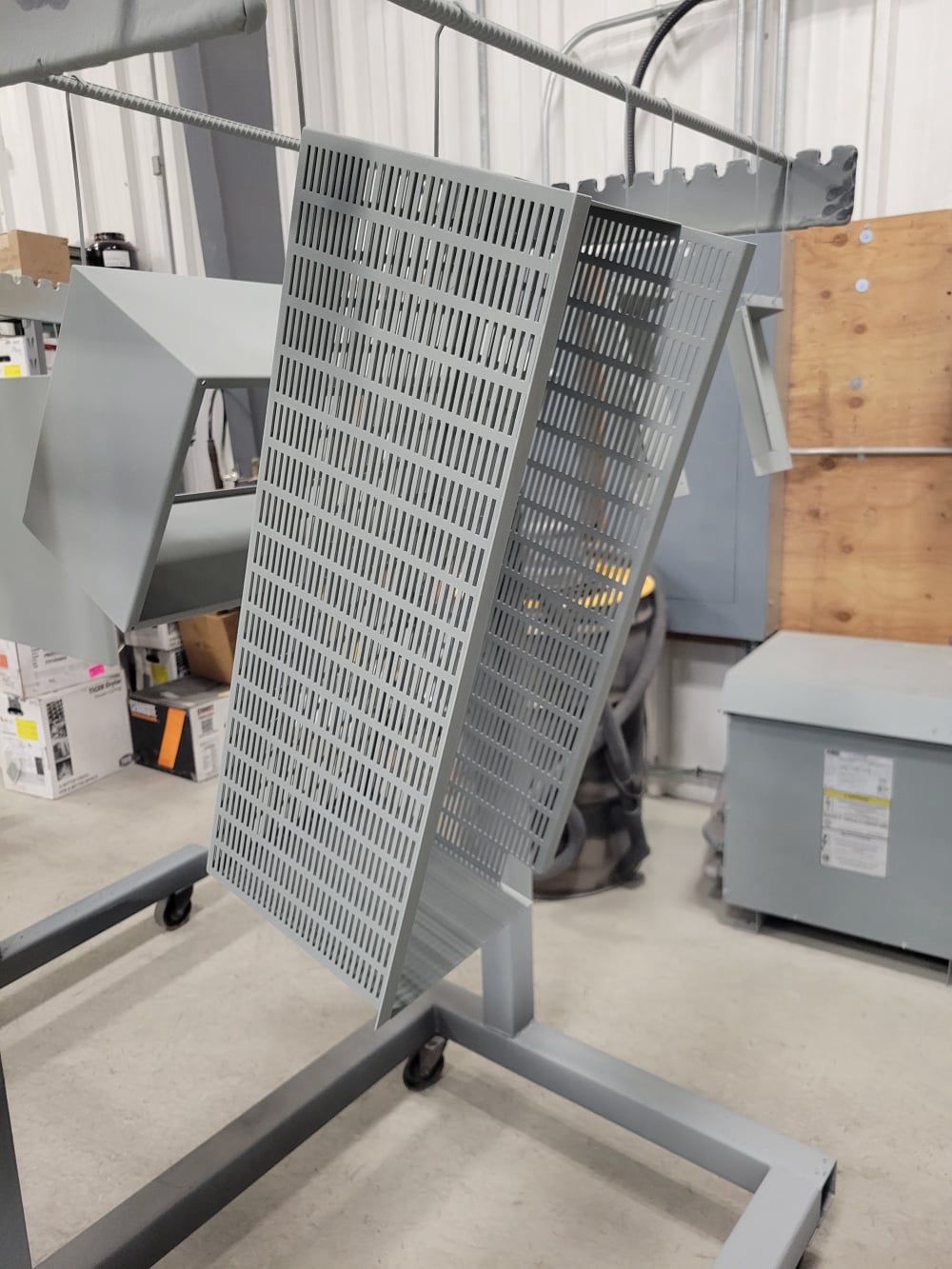 Punch cut slotted metal box, powder coated a light grey