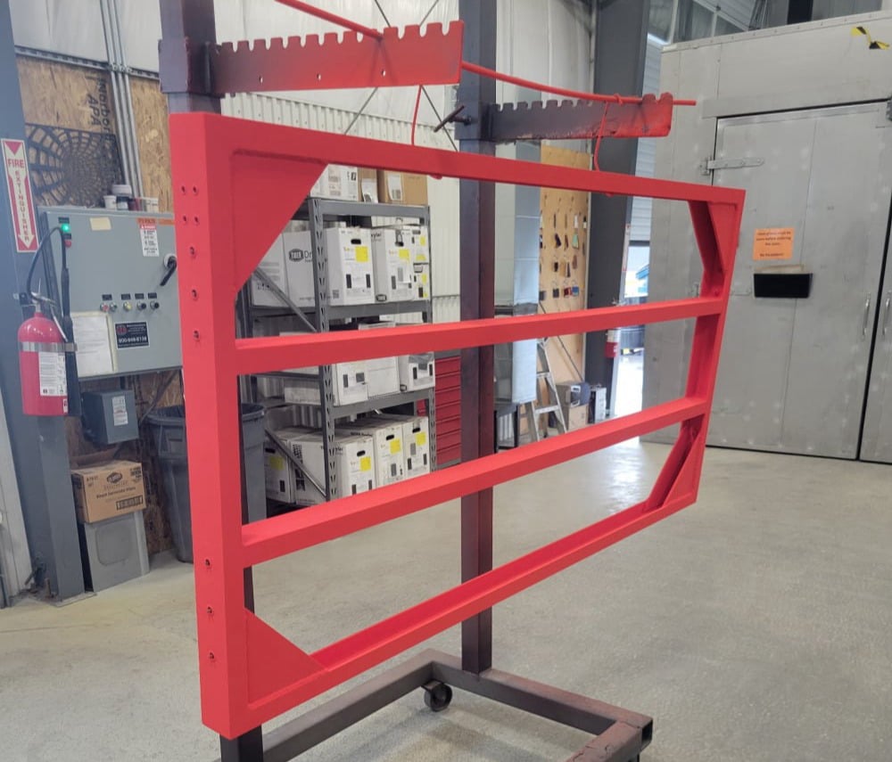 Laser cut and welded metal gate, powder coated in red