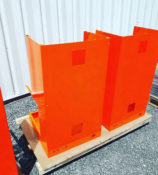 Laser cut rectangular metal boxes, powder coated bright orange